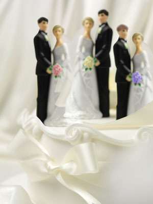 Three identical wedding cake toppers