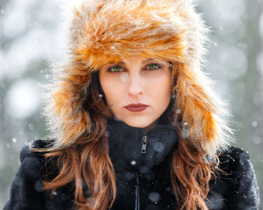 Beautiful woman in winter hat
